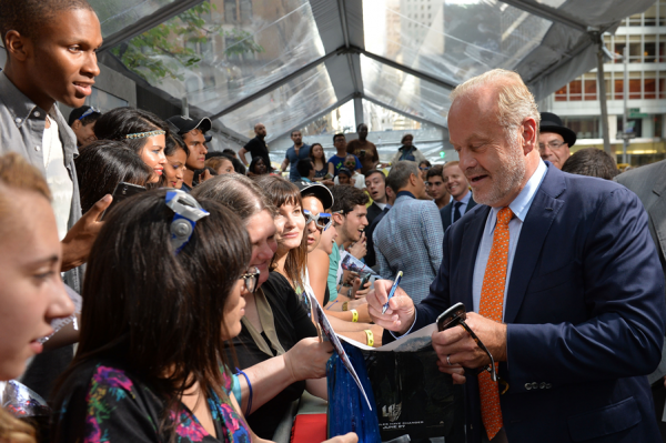 Kelsey Grammar signing autographs. 